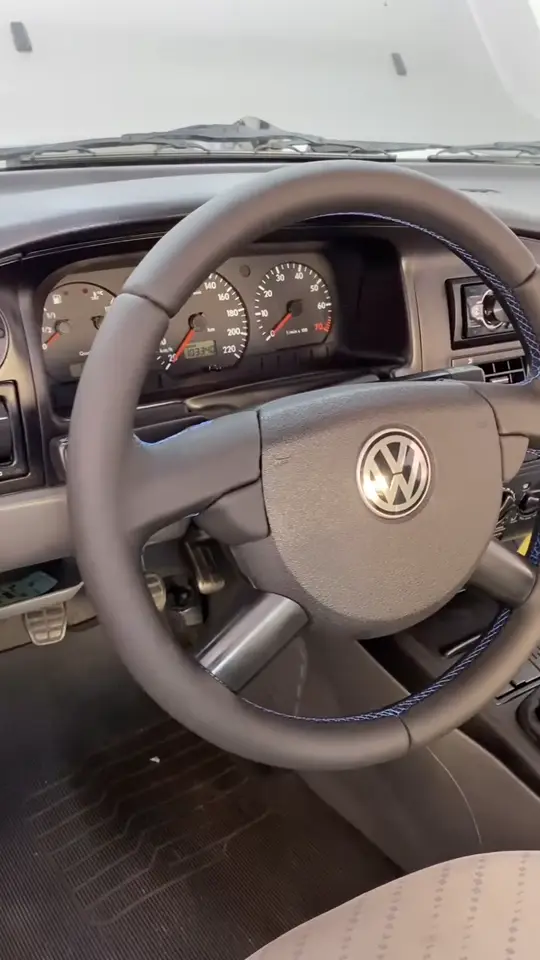 VW Santana: manopla e coifa · volante