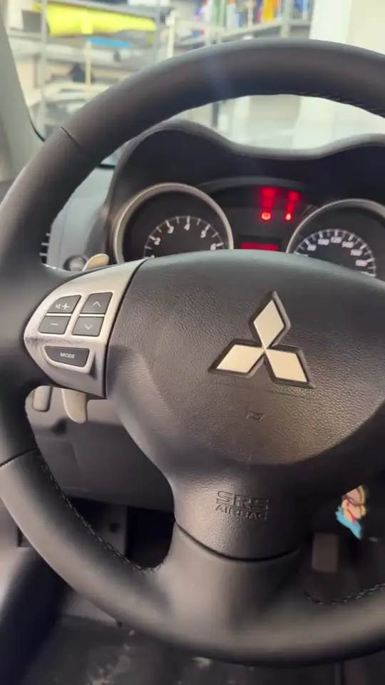 Mitsubishi Lancer: volante